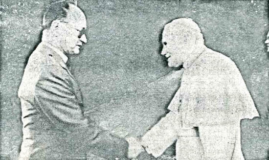 John Paul II shaking hands with Communist General Jaruzelski